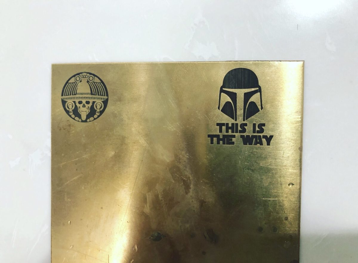 brass mark black