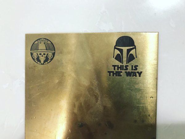 brass mark black